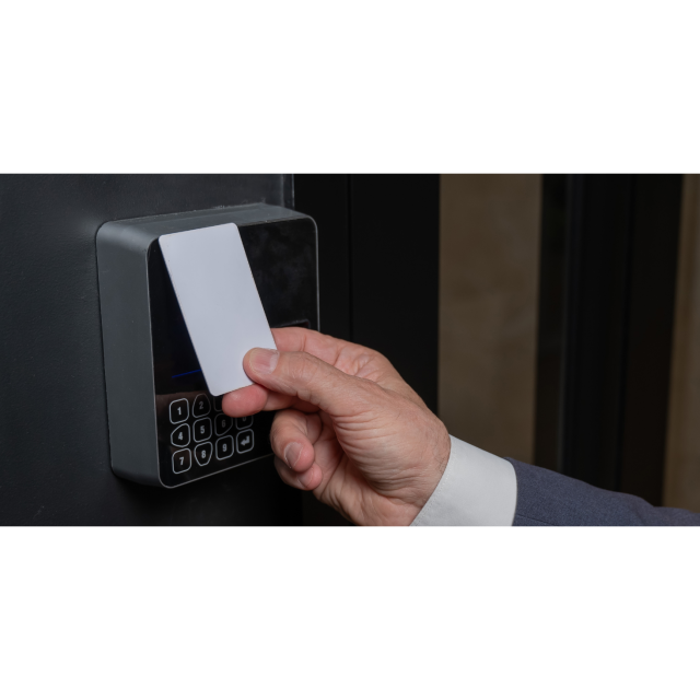 person using keycard near access control unit